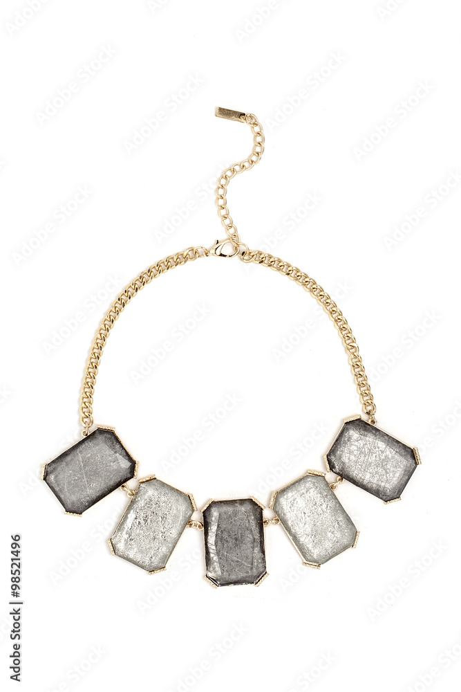 Gold necklace with grey stones isolated on white Gold necklace with grey stones isolated on white
