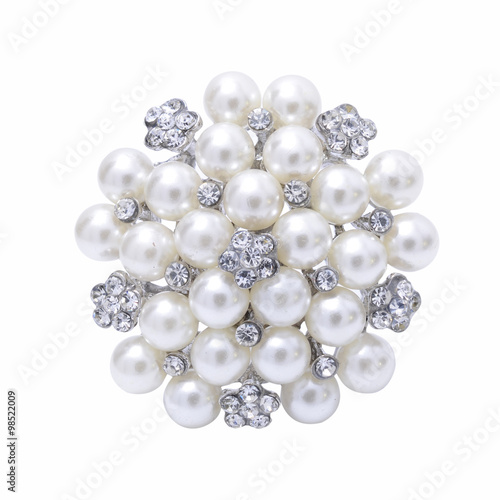 round brooch with pearls isolated on white