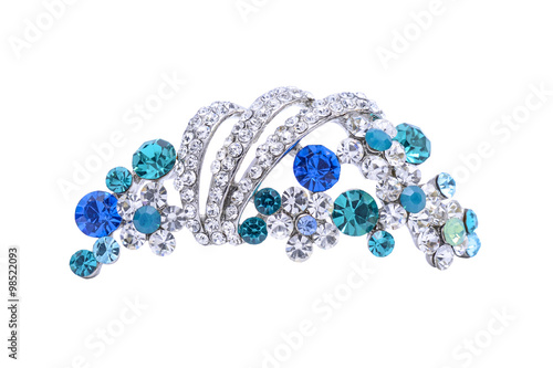 Print op canvas brooch with blue stones isolated on white