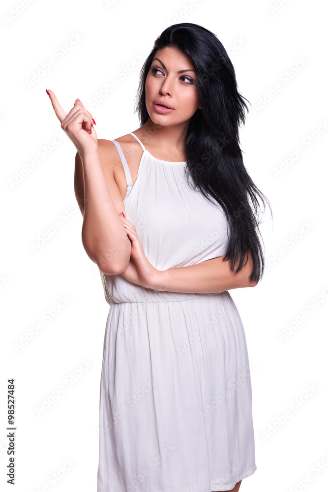 Attractive young woman in a white summer dress isolated over white Attractive young woman in a white summer dress isolated over white