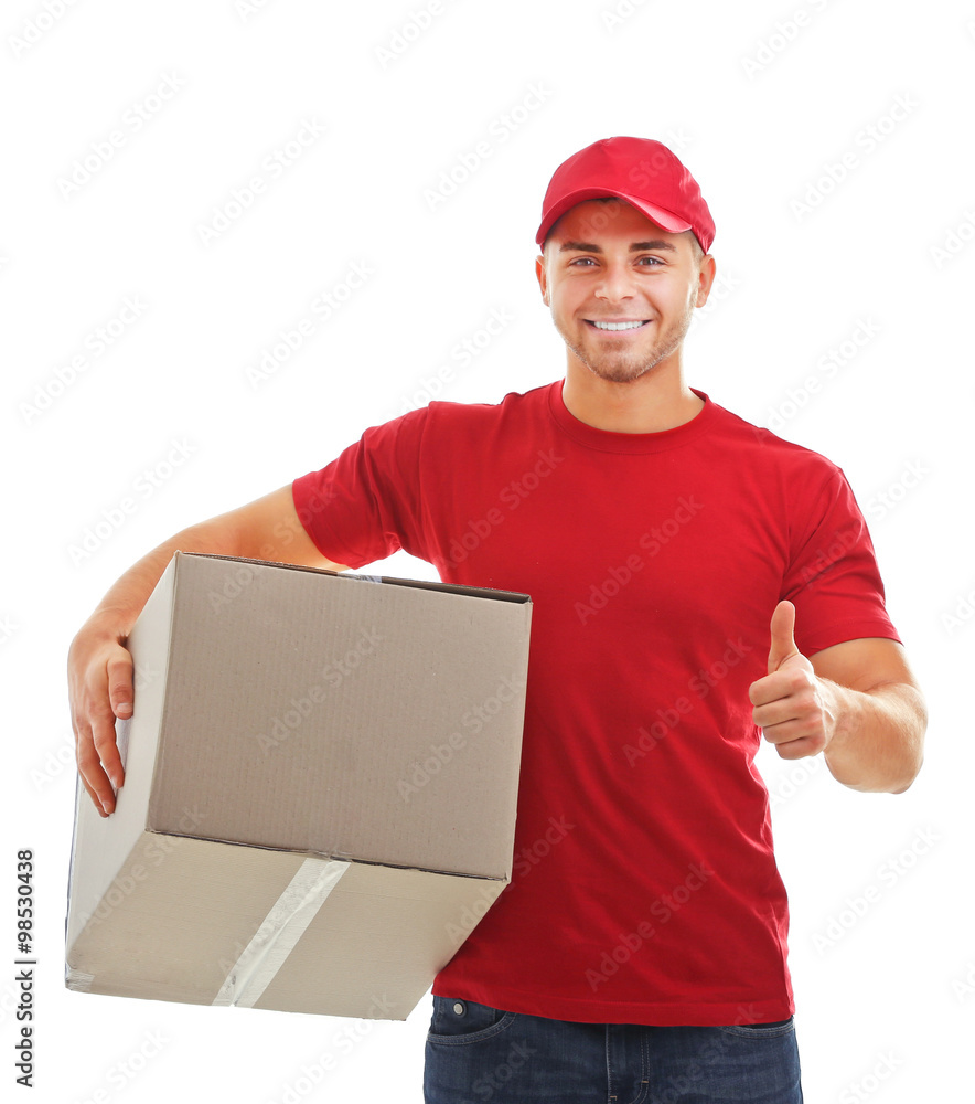 Delivery man in red uniform holding package isolated on white background Delivery man in red uniform holding package isolated on white background
