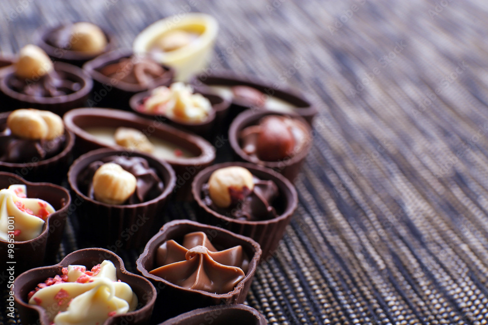 Chocolate sweets on fabric background Chocolate sweets on fabric background