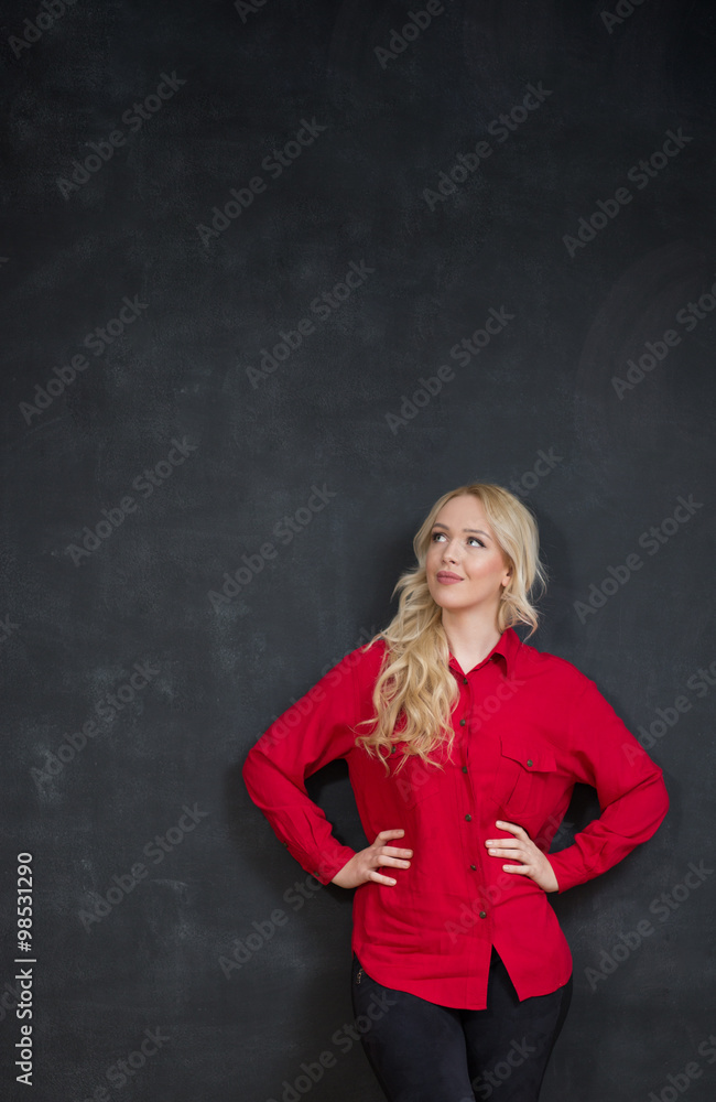 Attractive trendy young woman with a contemplative expression st Attractive trendy young woman with a contemplative expression st