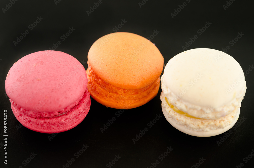 Colorful macaroon over black. Colorful macaroon over black.