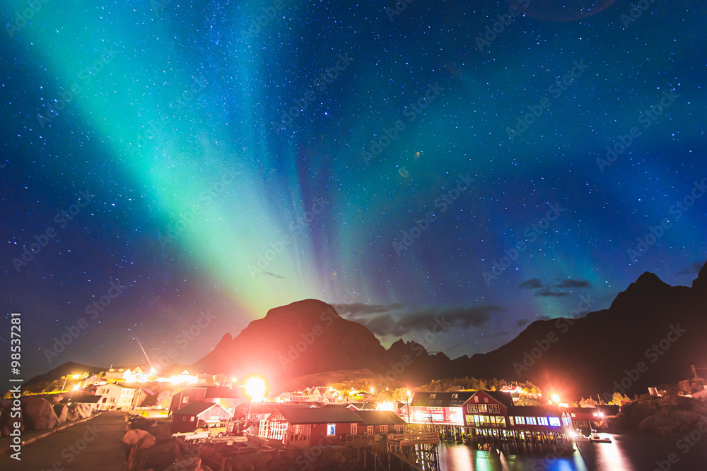 Obraz premium Beautiful picture of massive multicoloured vibrant Aurora Borealis, Aurora Polaris, also know as Northern Lights in the night sky over Norway, Lofoten Islands