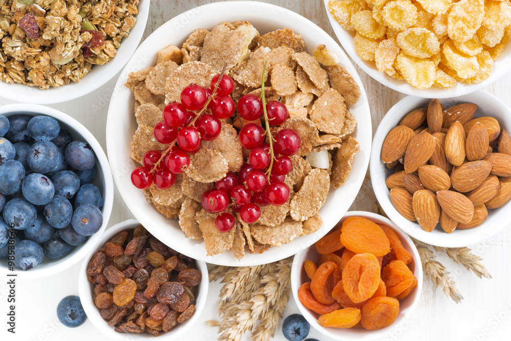 assortment of different breakfast cereal, dried fruit assortment of different breakfast cereal, dried fruit