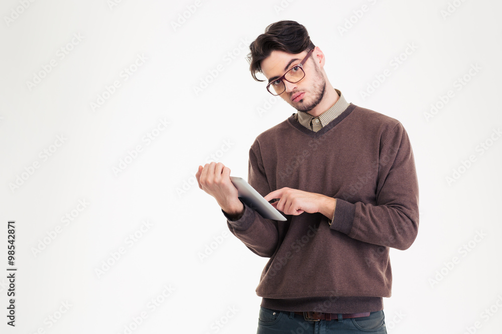 Young man using tablet computer Young man using tablet computer