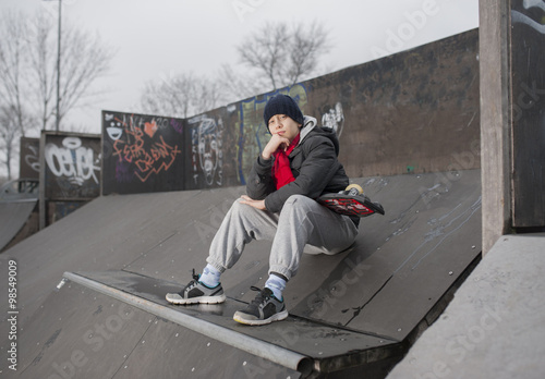 Boy at skate park photo