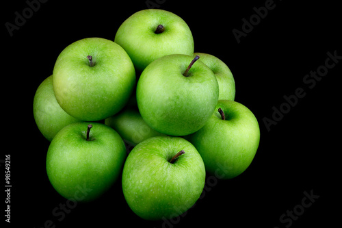Green Apples on a Black Background
