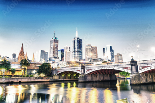 Stunning night skyline of Melbourne with river reflections