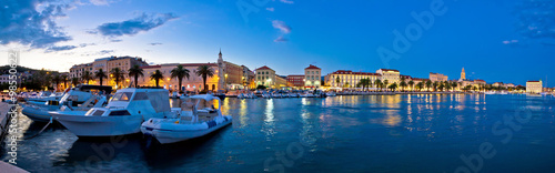 Split waterfront panorama in blue hour