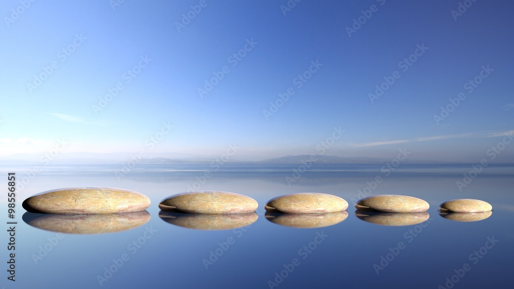 Zen stones row from large to small  in water with blue sky and peaceful landscape background - obrazy, fototapety, plakaty 