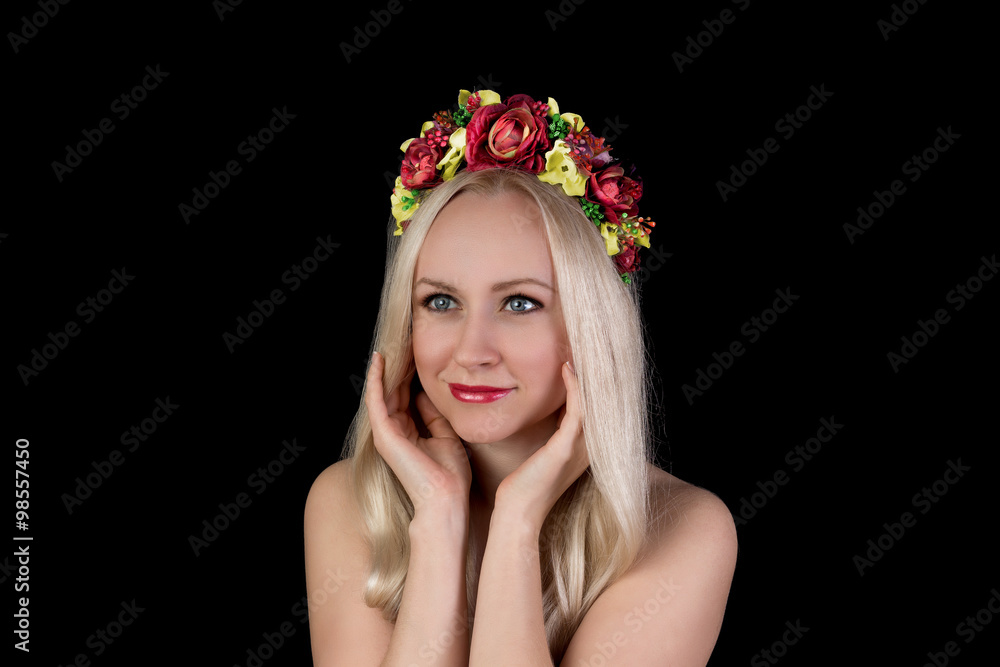 Beautiful smiling nude woman in flower crown