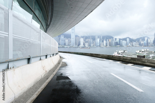 empty road and modern building cloudy skyline © zhu difeng