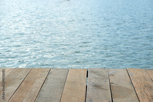 wood board pattern with water in background