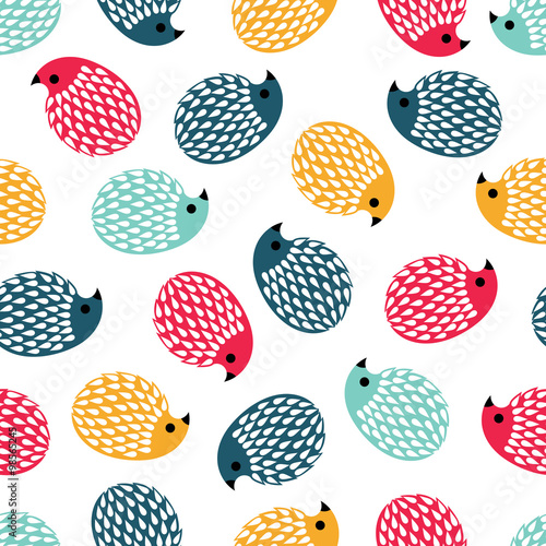 seamless background. colored hedgehogs on a white background.