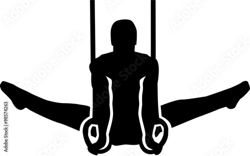 Man exercise at gymnastics rings