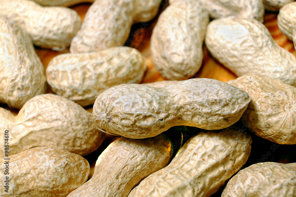 Macro peanut with peanuts in the background Macro peanut with peanuts in the background