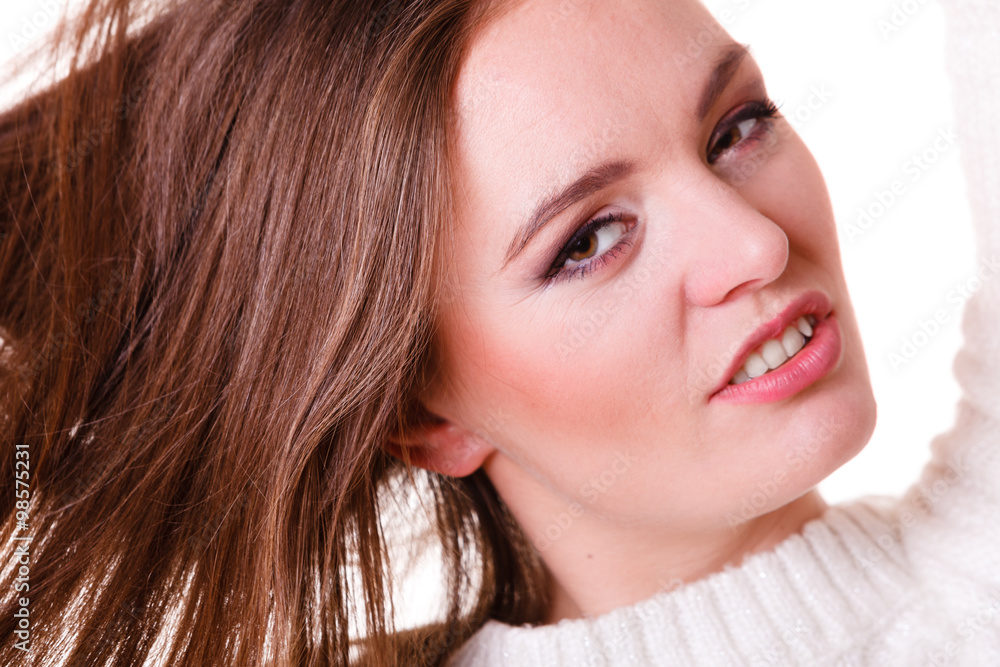 Fototapeta premium Woman combing and pulls hair.