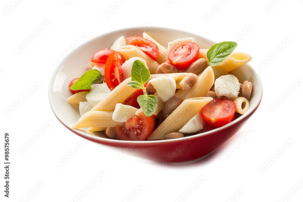 cold pasta salad with slice tomatoes mozzarella and beans