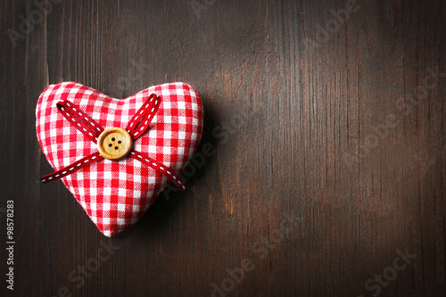 Beautiful romantic heart on wooden background