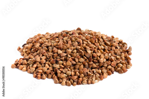 heap of buckwheat on white background