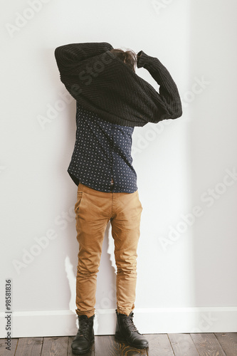 Fotografija filtered photo of a young stylish man dressing