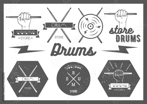 Vector set of vintage style drums labels, emblems and logo. Music design elements drum, drumsticks, hand, snare