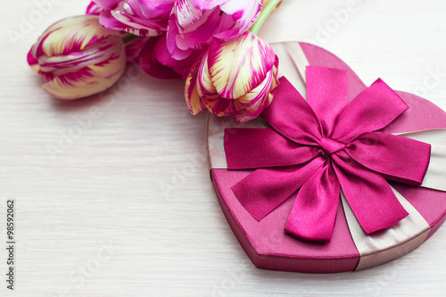 Heart shaped Valentines Day gift box with tulips and place for text
