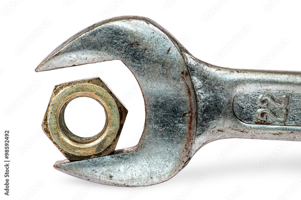 Closeup an old wrench and nut Closeup an old wrench and nut