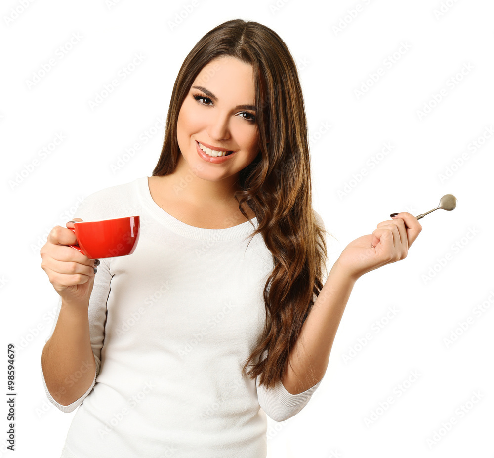 Happy beautiful woman with cup of coffee and spoon isolated on white background Happy beautiful woman with cup of coffee and spoon isolated on white background