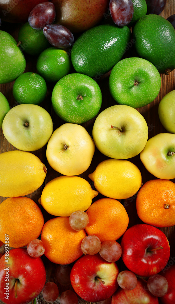 Fruits on wooden background, top view Fruits on wooden background, top view