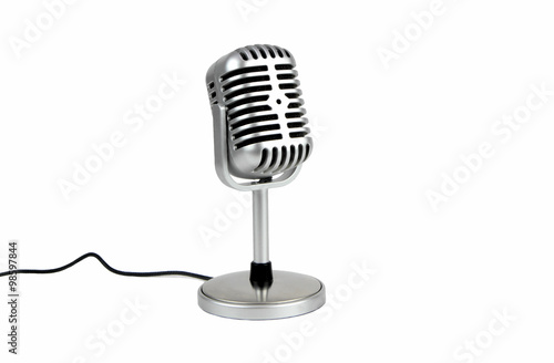 Retro microphone on white background.
