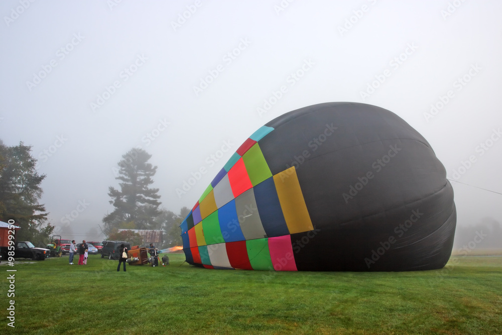 Obraz premium Colorful Hot air balloons preparing for flight in Vermont ..