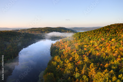 An aerial view of a hot air balloon floating over the Vermont country side .. © Chee-Onn Leong