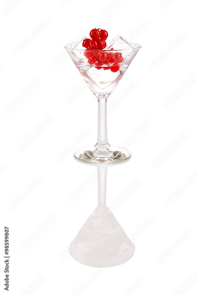 Glass with ice cubes and cranberry. Glass with ice cubes and cranberry.