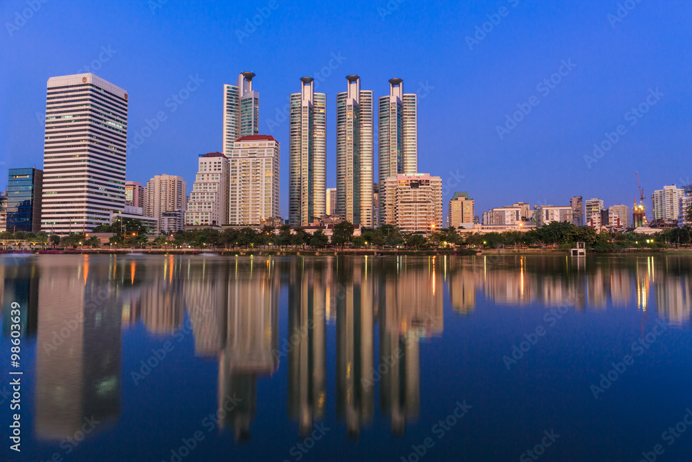 Commercial building in Bangkok city at twilight with skyline,Thailand
