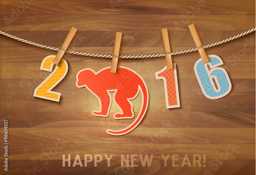 2016 with a goat on wooden background. Vector.