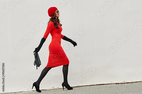 Fashion Lady In Red Dress in the city