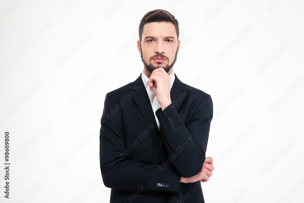 Portrait of a pensive businessman looking at camera Portrait of a pensive businessman looking at camera