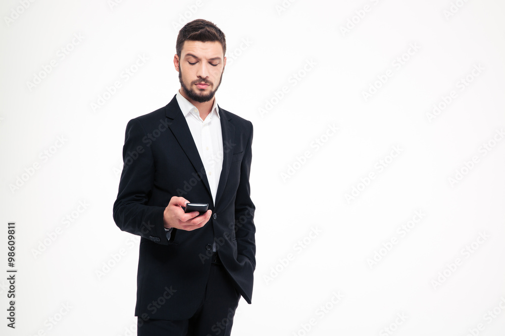 Serious businessman using smartphone Serious businessman using smartphone