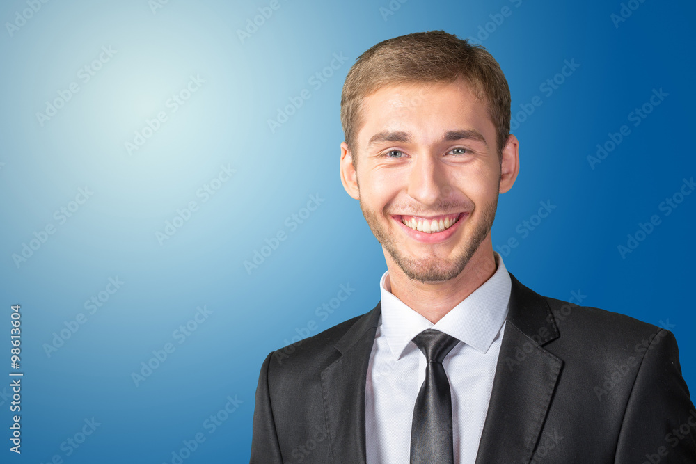 Young handsome businessman smiling Young handsome businessman smiling