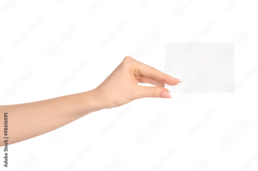 Branding and advertising theme: beautiful female hand holding a blank white paper card isolated on white background Branding and advertising theme: beautiful female hand holding a blank white paper card isolated on white background