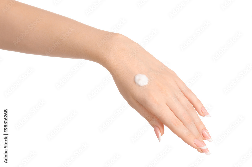 Health and body care theme: beautiful female hand with white cream isolated on a white background, hand massage Health and body care theme: beautiful female hand with white cream isolated on a white background, hand massage