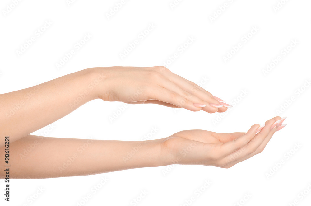 Health and body care theme: beautiful female hand with white cream isolated on a white background, hand massage