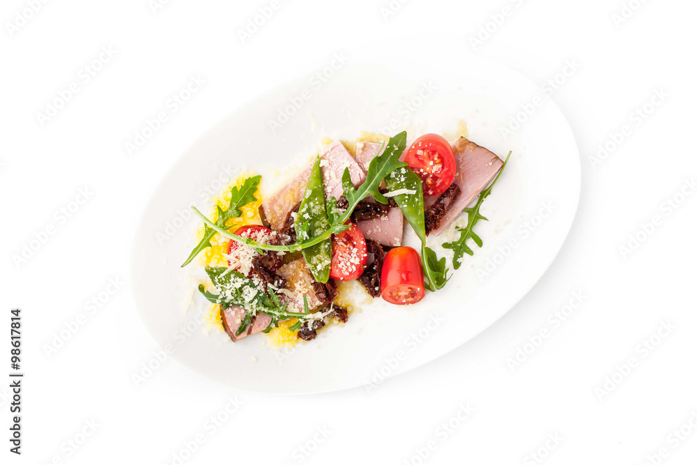 Salad with smoked ham and arugula in the white background horizontal Salad with smoked ham and arugula in the white background horizontal