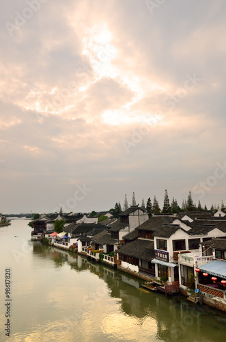 Old village by river in Shanghai with boat.. © Chee-Onn Leong