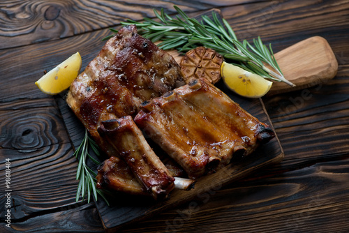 Roasted pork ribs with fresh rosemary, garlic and lemon