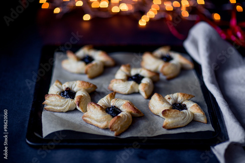 Joulutorttu, traditional finnish christmas pastry. Dark photo. selective focus