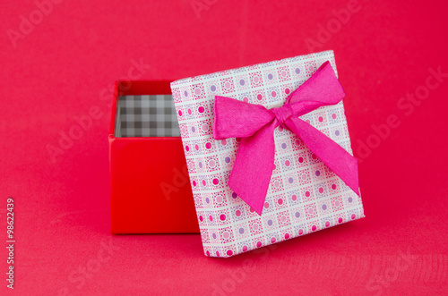 gift box on isolated red background